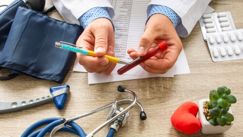 Doctor showing anemic blood sample